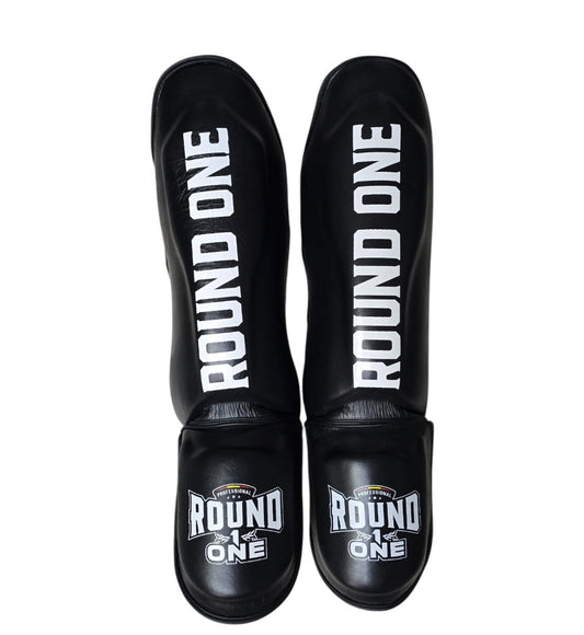 Protectores de tibias Round1one